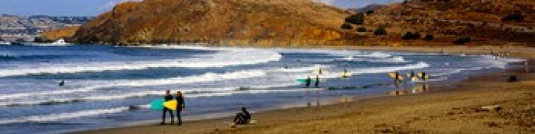 Surfers on the beach California USA Canvas Art - Panoramic Images (40 x 10)