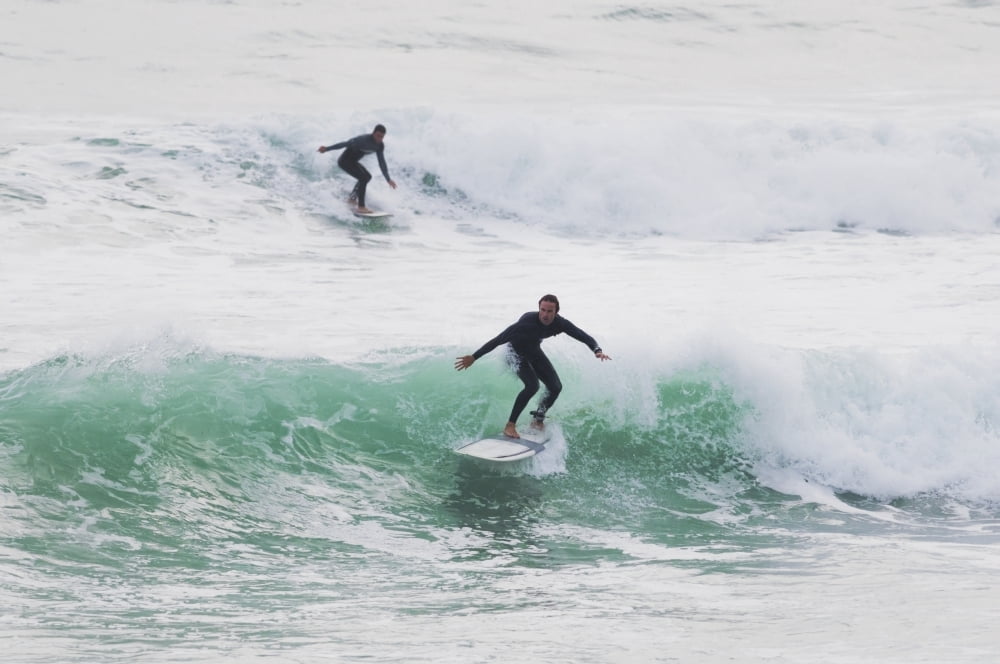 Surfers riding waves Tarifa Costa de la Luz Cadiz Andalusia Spain Canvas Art - Ben Welsh Design Pics (19 x 12)