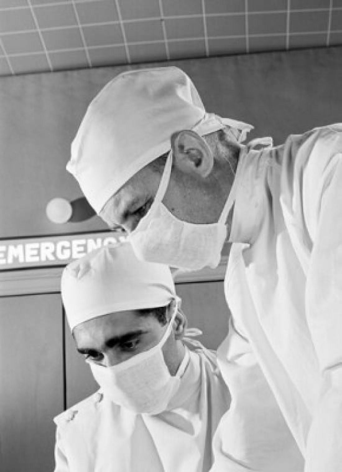 Surgeons concentrating during operation Canvas Art - (18 x 24)