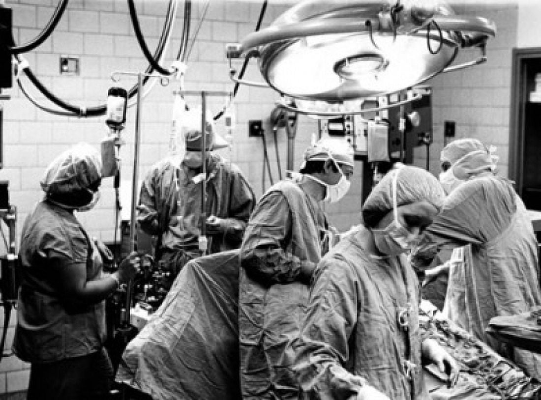 Surgeons working in an operating room Canvas Art - (18 x 24)