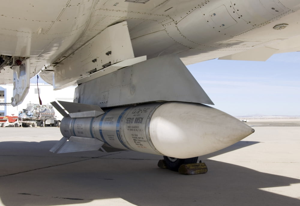 Surplus Navy Phoenix missiles mounted on the centerline pylon of NASAs F-15B research aircraft Canvas Art - Stocktrek Images (33 x 23)
