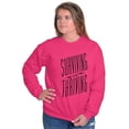 thumbnail image 1 of Surviving And Thriving Breast Cancer Women Crewneck Sweatshirt Brisco Brands S, 1 of 6
