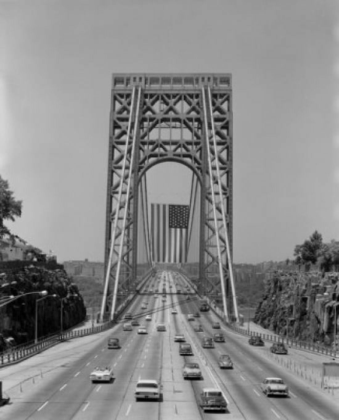 Suspended bridge with driving cars and hanging American flag Canvas Art - (18 x 24)