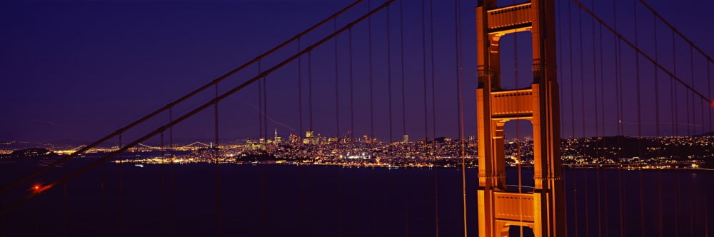 Suspension bridge across a bay at dusk Golden Gate Bridge San Francisco Bay San Francisco California USA Canvas Art - Panoramic Images (36 x 12)