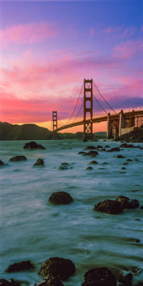 Suspension bridge across a bay at dusk Golden Gate Bridge San Francisco Bay San Francisco California USA Canvas Art - Panoramic Images (9 x 27)