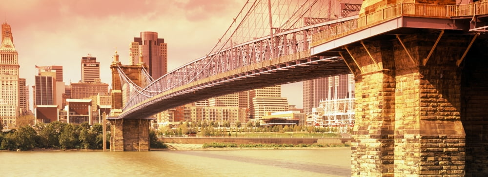 Suspension bridge across the Ohio River with skyscrapers in the background Cincinnati Ohio USA Canvas Art - Panoramic Images (7 x 18)
