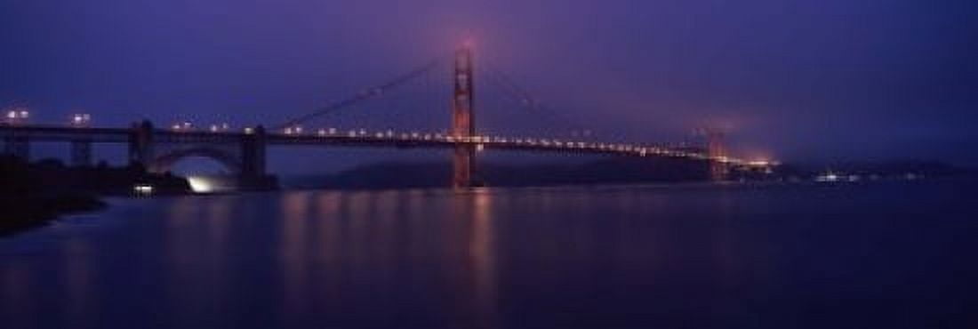 Suspension bridge lit up at dawn viewed from fishing pier Golden Gate Bridge San Francisco Bay San Francisco California USA Canvas Art - Panoramic Images (18 x 6)