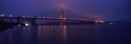 Suspension bridge lit up at dawn viewed from fishing pier Golden Gate Bridge San Francisco Bay San Francisco California USA Canvas Art - Panoramic Images (36 x 12)