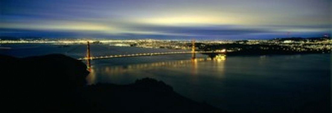 Suspension bridge lit up at dusk Golden Gate Bridge San Francisco Bay San Francisco California USA Canvas Art - Panoramic Images (18 x 6)
