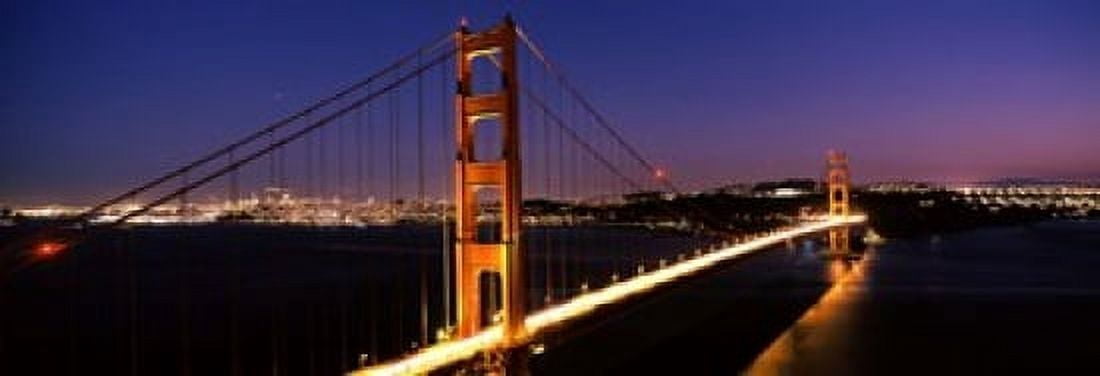 Suspension bridge lit up at dusk Golden Gate Bridge San Francisco California USA Canvas Art - Panoramic Images (18 x 7)