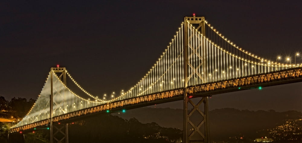 Suspension bridge lit up at night Bay Bridge San Francisco Bay San Francisco California USA Canvas Art - Panoramic Images (12 x 24)