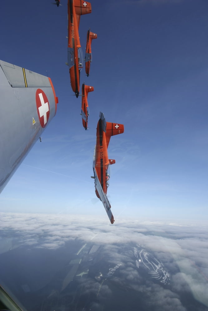 Swiss Air Force display team PC-7 Team flying the Pilatus PC-7 turboprop trainer aircraft Canvas Art - Daniel KarlssonStocktrek Images (12 x 18)