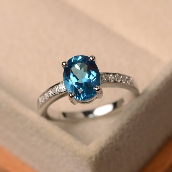 Swiss blue topaz ring, oval cut blue topaz ring, white gold