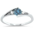 thumbnail image 1 of Synthetic Aquamarine CZ Three Stone Wavy Ring Sterling Silver Size 3, 1 of 3