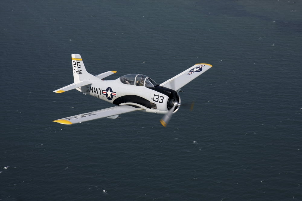T-28 Trojan trainer warbird in US Navy colors Canvas Art - Daniel KarlssonStocktrek Images (35 x 24)