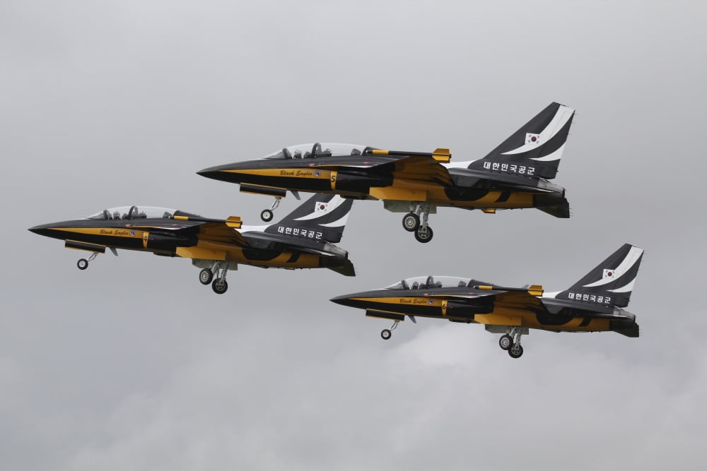 T-50 Golden Eagles from the Republic of Korea Air Force Aerobatic Team Canvas Art - Ofer ZidonStocktrek Images (35 x 23)