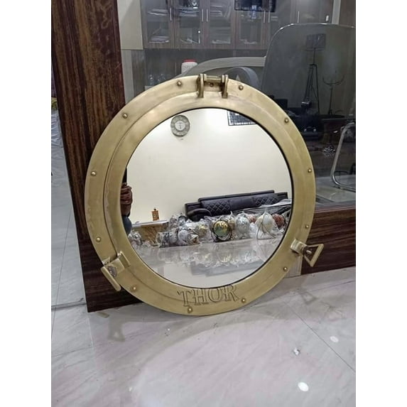 THOR INSTRUMENTS Brass Polished Porthole Mirror | Pirate's Boat Decorative Mirror | Nautical Maritime Home Decor (9 Inches, Brass Finish) Halloween Decorations Costumes
