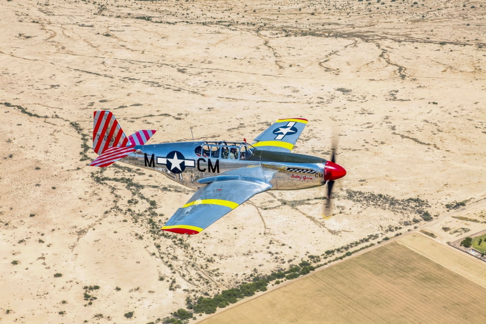TP-51C Mustang over the central Arizona desert Canvas Art - Scott GermainStocktrek Images (35 x 23)