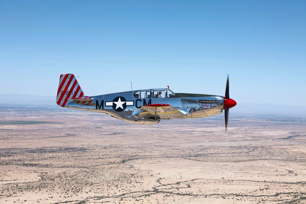 TP-51C Mustang over the central Arizona desert Canvas Art - Scott GermainStocktrek Images (35 x 23)
