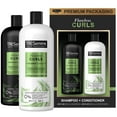 thumbnail image 1 of TRESemmé Flawless Curls Shampoo and Conditioner Set, Curly Hair Products with Coconut Oil Leaves Curls Defined, Sulfate Free, Frizz Free, 28 Fl Oz Ea, 1 of 9