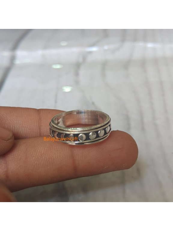 Boho Artisan Silver Spinner Ring With Handmade Textured Statement Band And Smooth Rotating Design For Women Everyday Wear