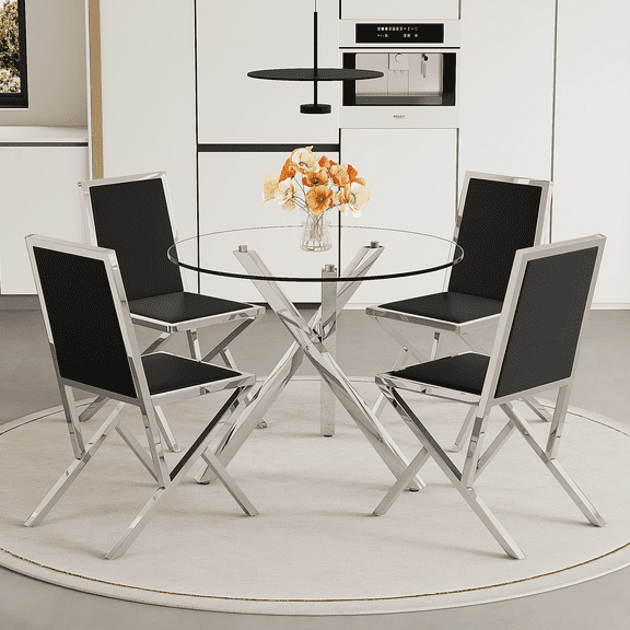 Table and chair set.Modern glass round table:39 inch diameter,X-shaped silver metal bracket.Paired with 4 black metal bracket PU chairs.Modern light luxury home restaurant table and chair combination