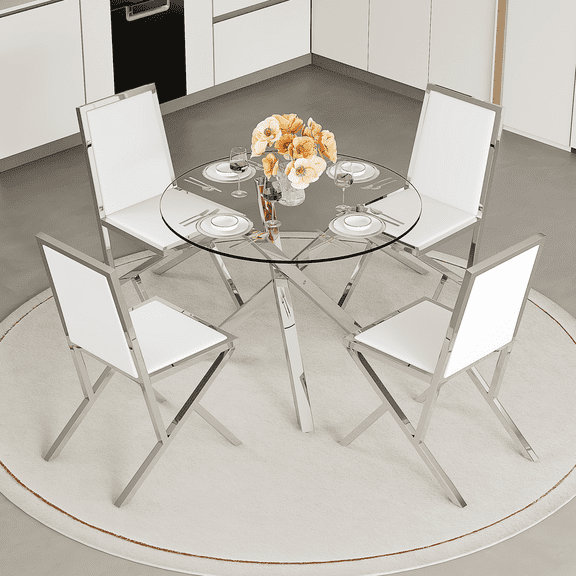 Table and chair set.Modern glass round table:39 inch diameter,X-shaped silver metal bracket.Paired with 4 white metal bracket PU chairs.Modern light luxury home restaurant table and chair combination