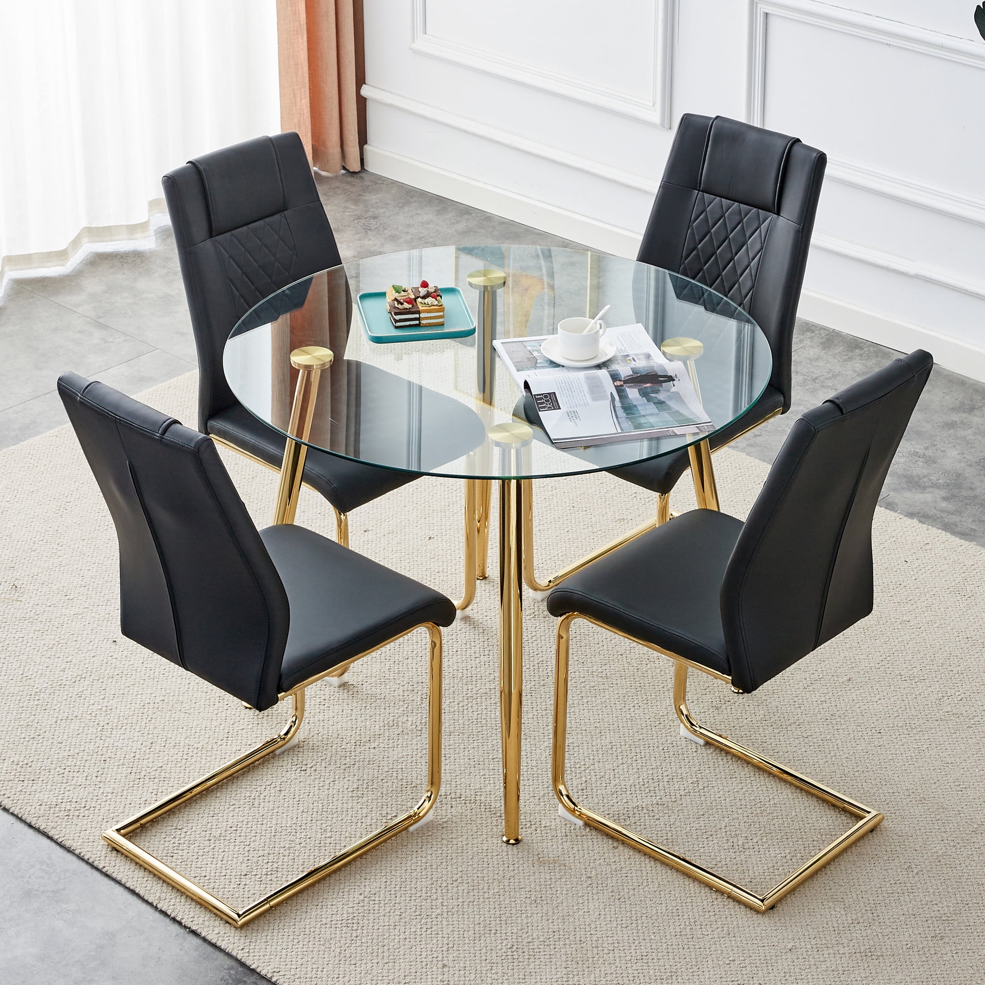 Table and chair set. Round dining table, glass tabletop with a diameter of 40 inches, and gold-plated metal legs, paired with 4 black PU cushions and a dining chair with gold-plated metal feet. DT1164