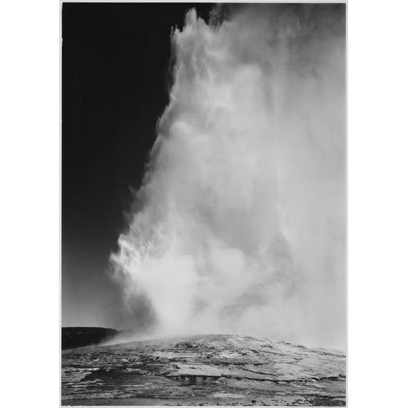 Taken at dusk or dawn from various angles during eruption. "Old Faithful Geyser Yellowstone National Park" Wyoming