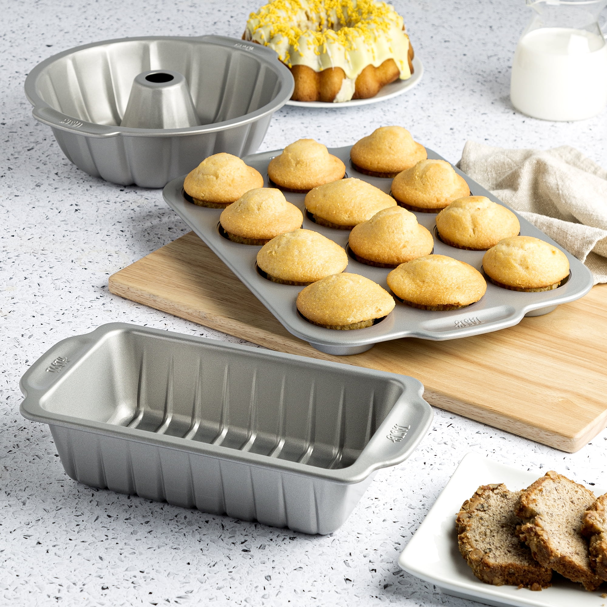 Tasty 3 Piece Carbon Steel Baking Set: 9x5 Loaf Pan, 9 Fluted Cake Pan,  and 12 Cup Muffin Pan 