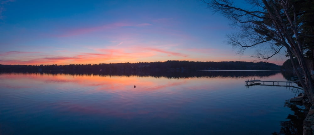 Taylor Pond with dock at sunset Auburn Androscoggin County Maine USA Canvas Art - Panoramic Images (6 x 15)