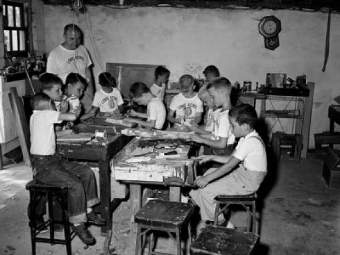 Teacher and students in a carpentry workshop Canvas Art - (24 x 36)