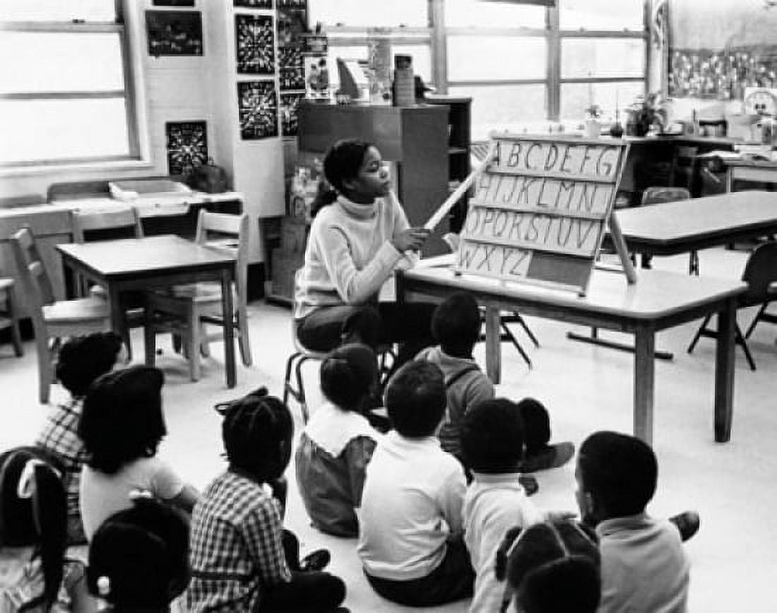 Teacher teaching her students in a classroom Canvas Art - (18 x 24)