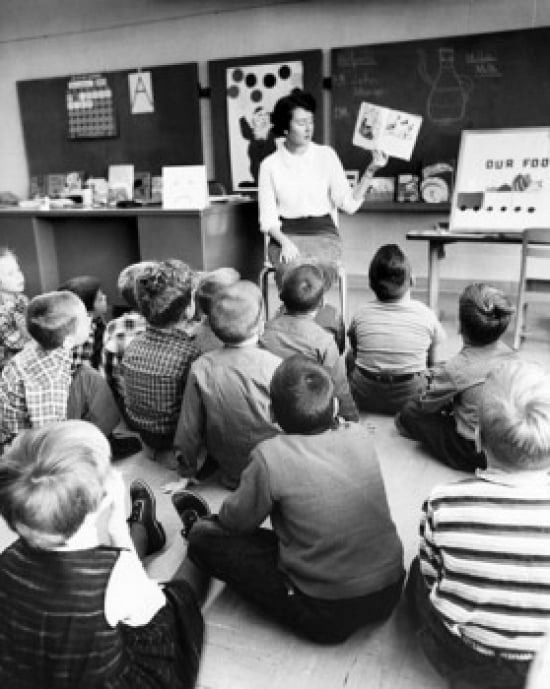 Teacher teaching students in a classroom Canvas Art - (18 x 24)