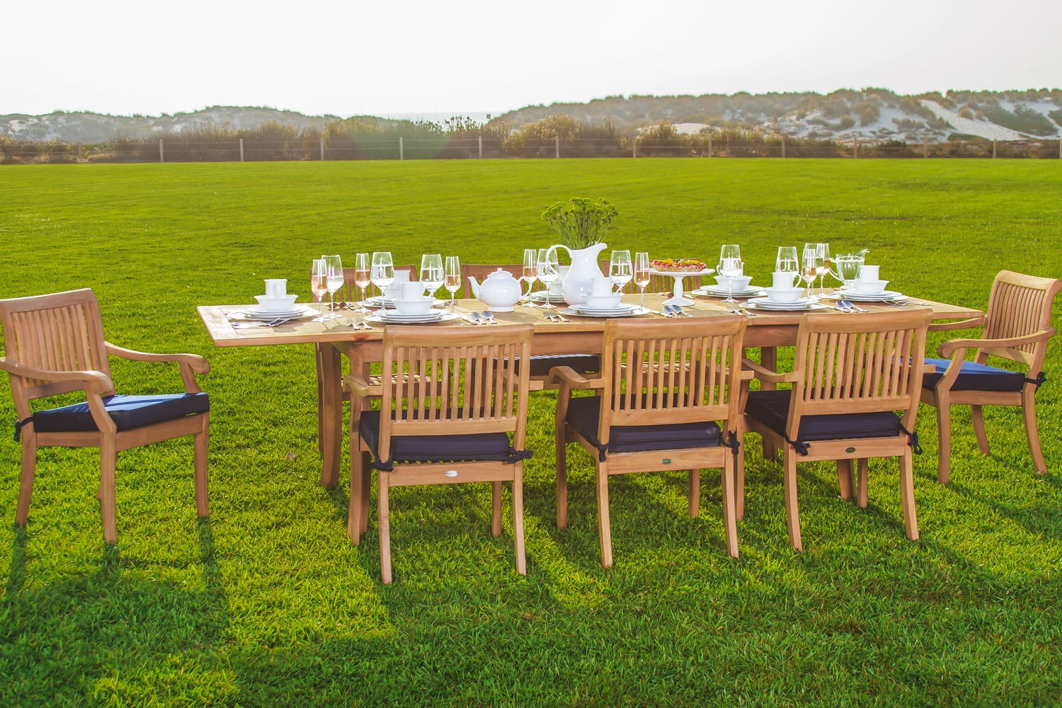 Natural Teak 9-Piece Outdoor Dining Set with 8 Stacking Chairs