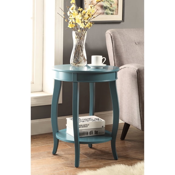 Teal round leg accent table with wooden apron and open bottom shelf for cozy corners