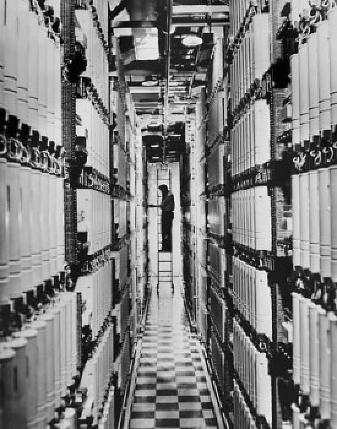 Technician working in a telephone network control room Canvas Art - (24 x 36)