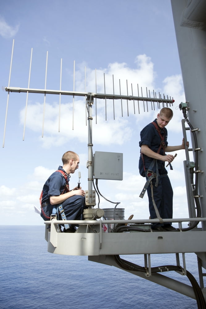 Technicians perform maintenance on the OE-578 antenna Canvas Art - Stocktrek Images (23 x 35)