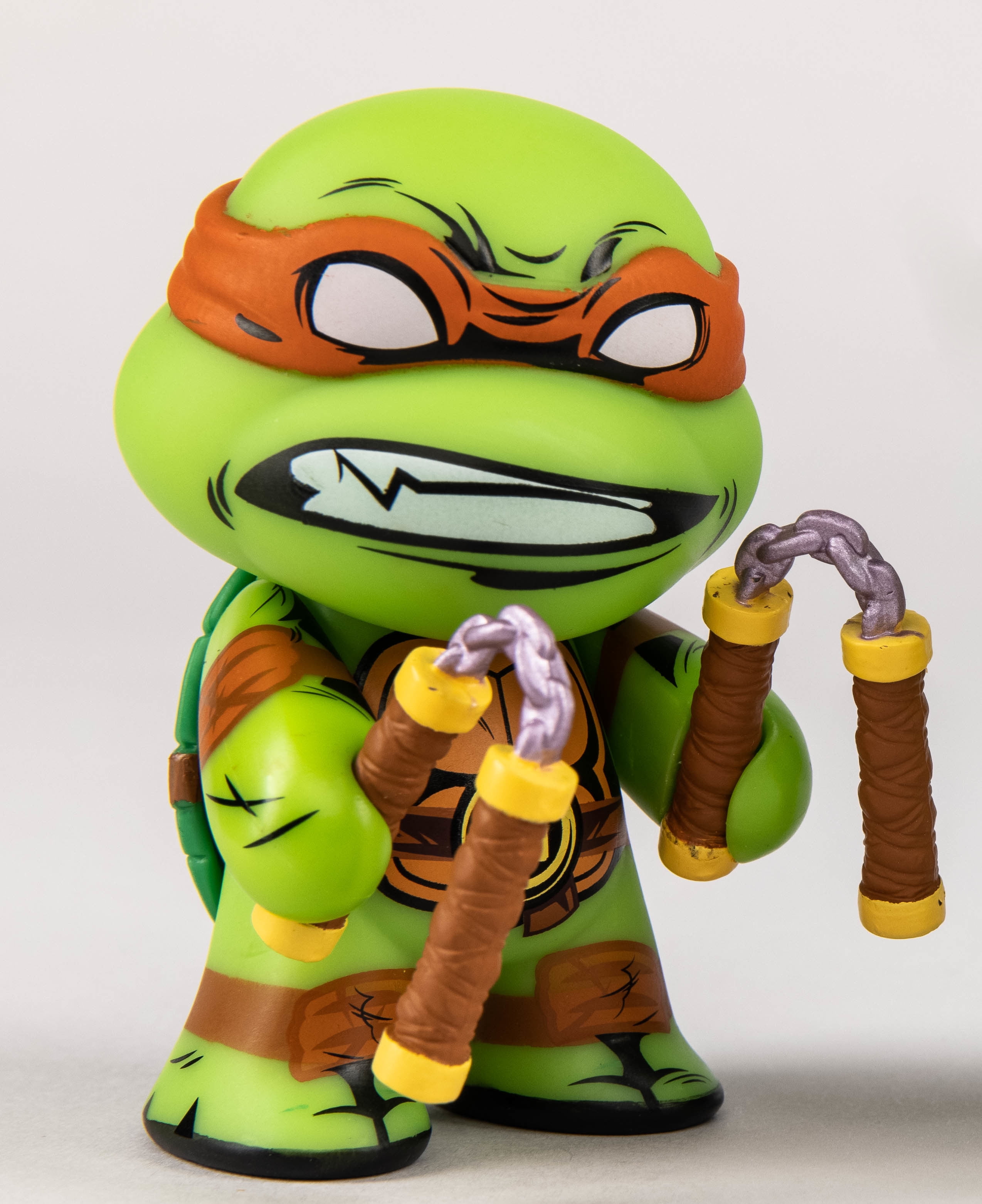 Kidrobot Teenage Mutant Ninja Turtles: Michelangelo Turtle, with Stylish Window Box (3"), Including Signature Weapon