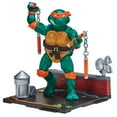 thumbnail image 1 of Teenage Mutant Ninja Turtles: 4” Remastered Michelangelo Action Figure by Playmates Toys, 1 of 7