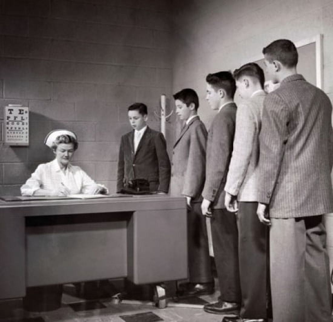 Teenage boys standing in a row beside a nurses desk Canvas Art - (24 x 36)