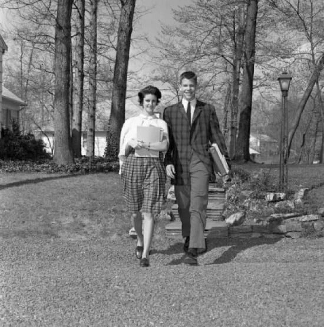 Teenage brother and sister walking in park Canvas Art - (24 x 36)
