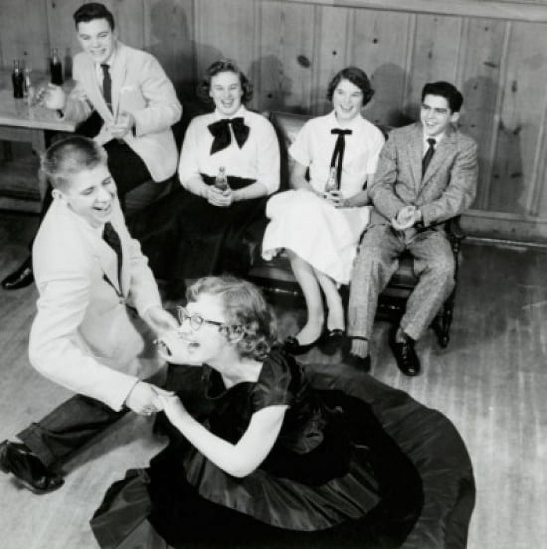 Teenage couple dancing at a party with two teenage couples sitting behind them Canvas Art - (24 x 36)