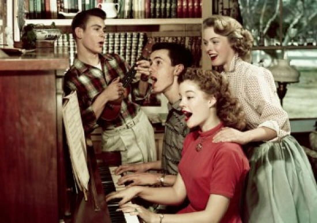 Teenage couple playing a piano with another teenage couple standing near them Canvas Art - (18 x 24)