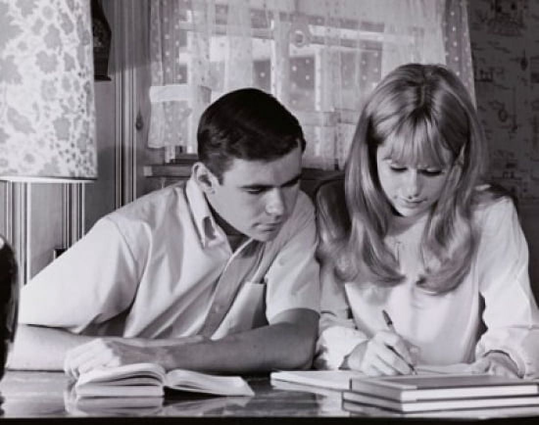 Teenage couple studying Canvas Art - (18 x 24)