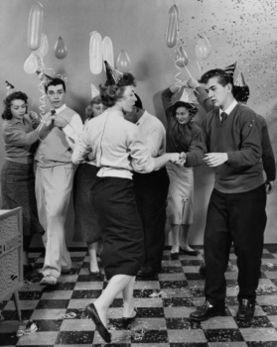Teenage couples dancing at a new years party Canvas Art - (18 x 24)