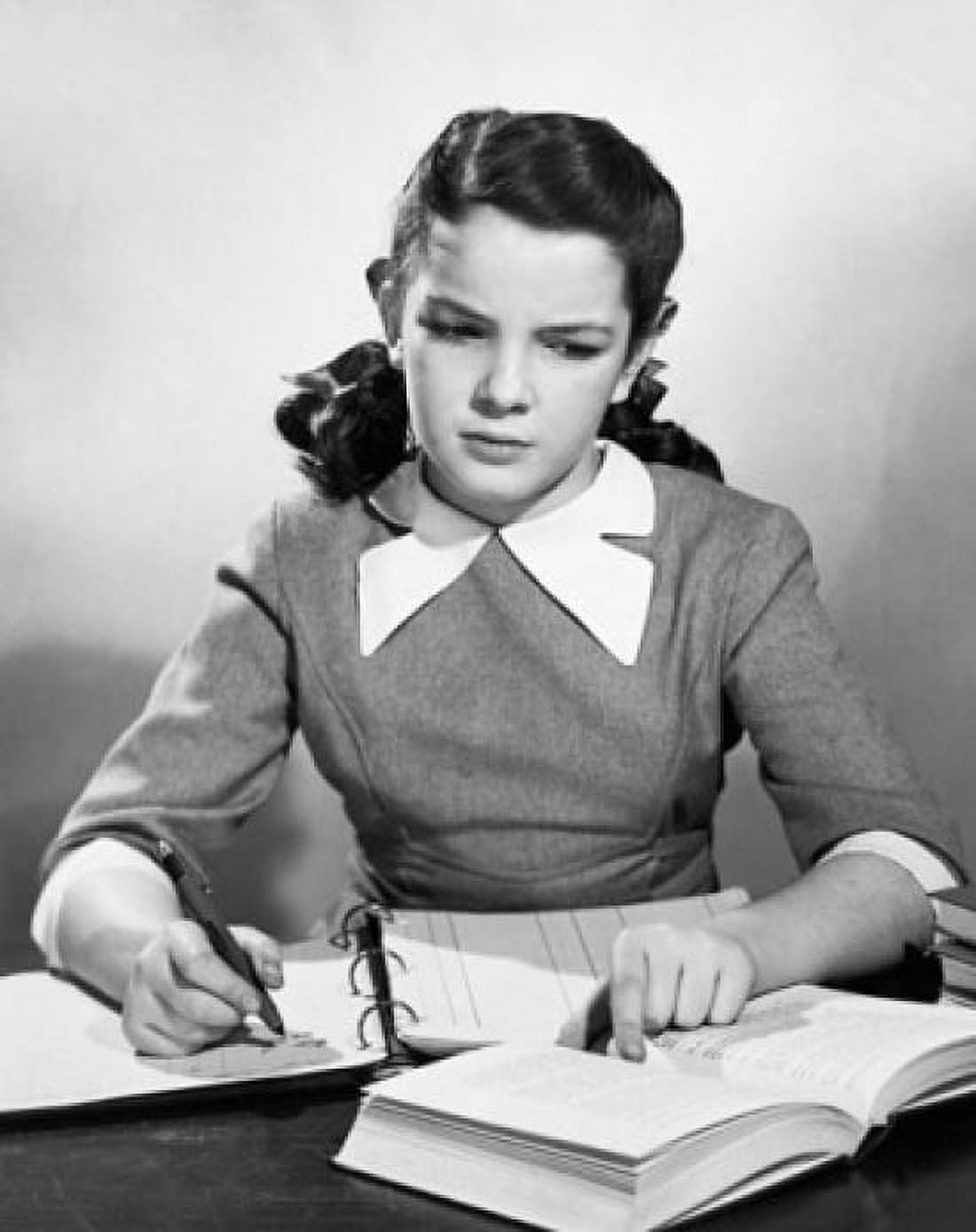 Teenage girl doing homework Canvas Art - (24 x 36)