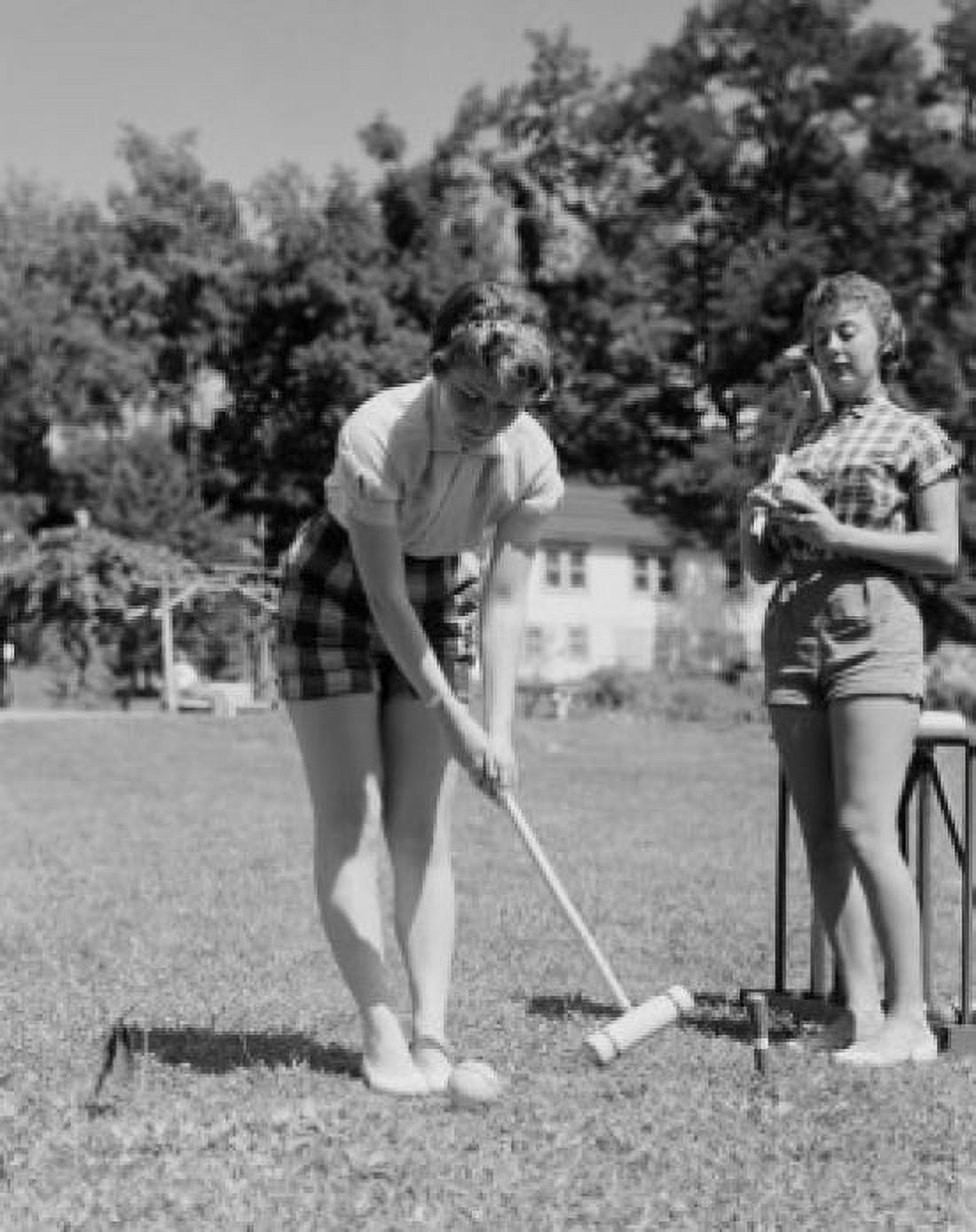 Teenage girls playing croquet Canvas Art - (24 x 36)