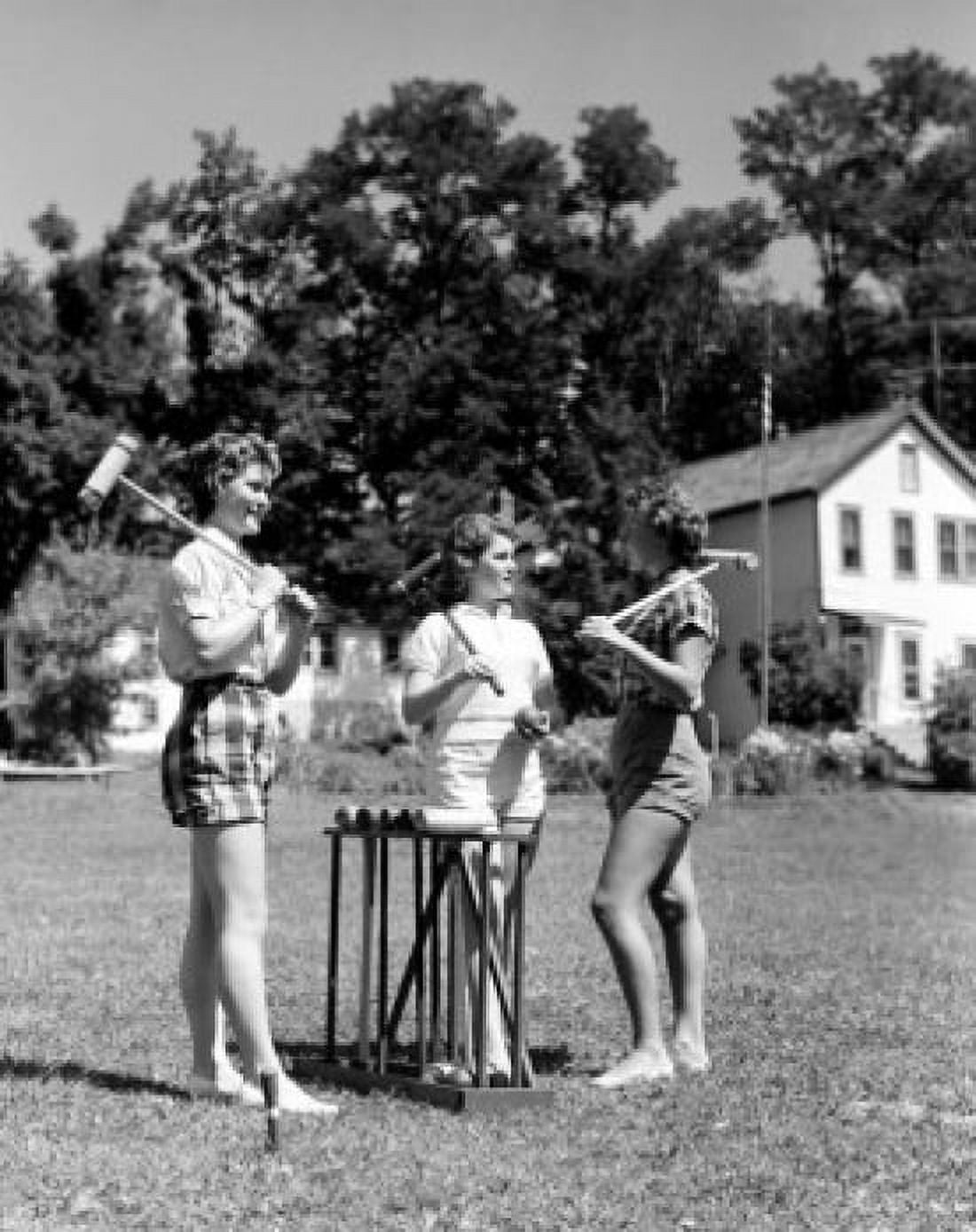 Teenage girls with croquet mallets Canvas Art - (18 x 24)