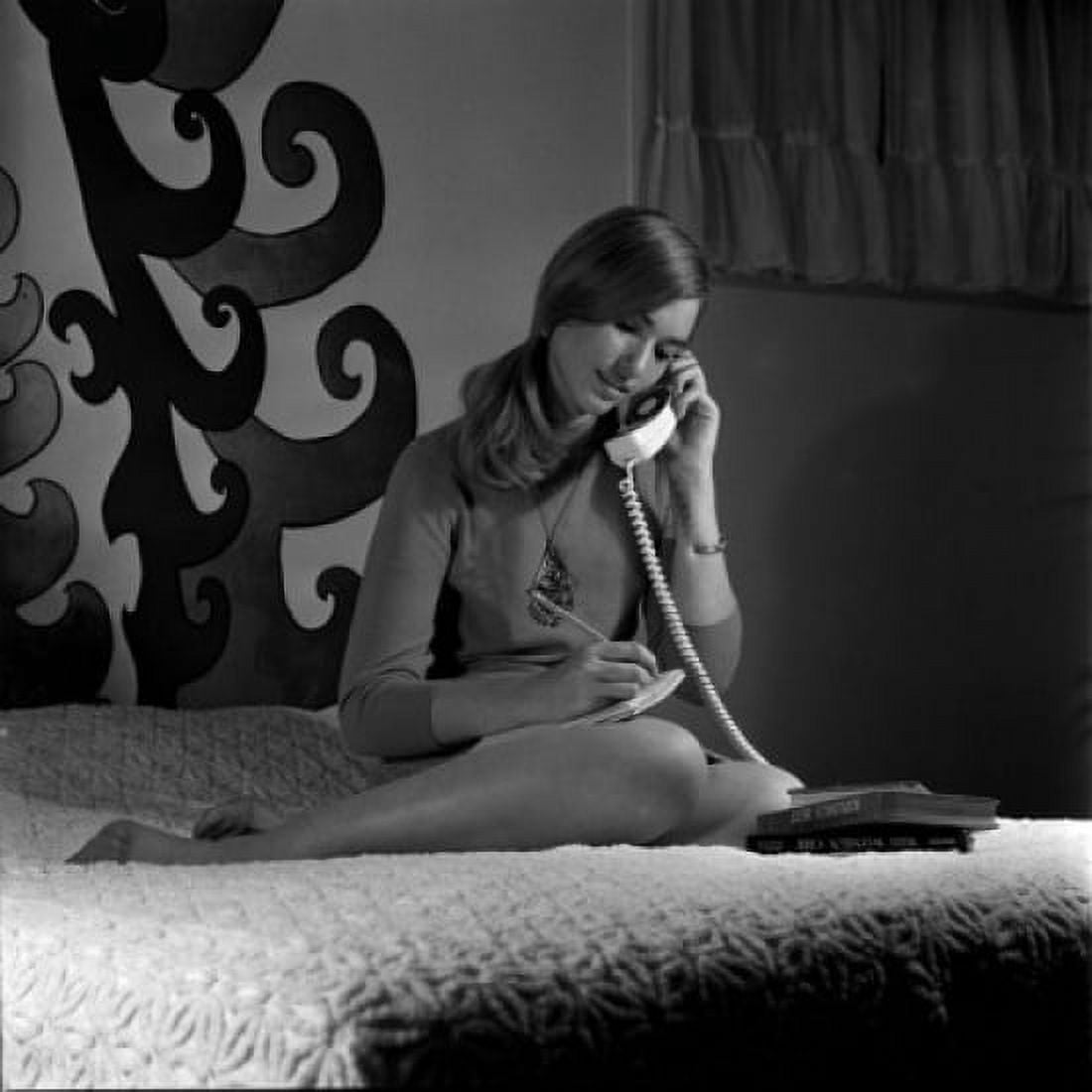 Teenage talking through phone and doing notes Canvas Art - (24 x 36)